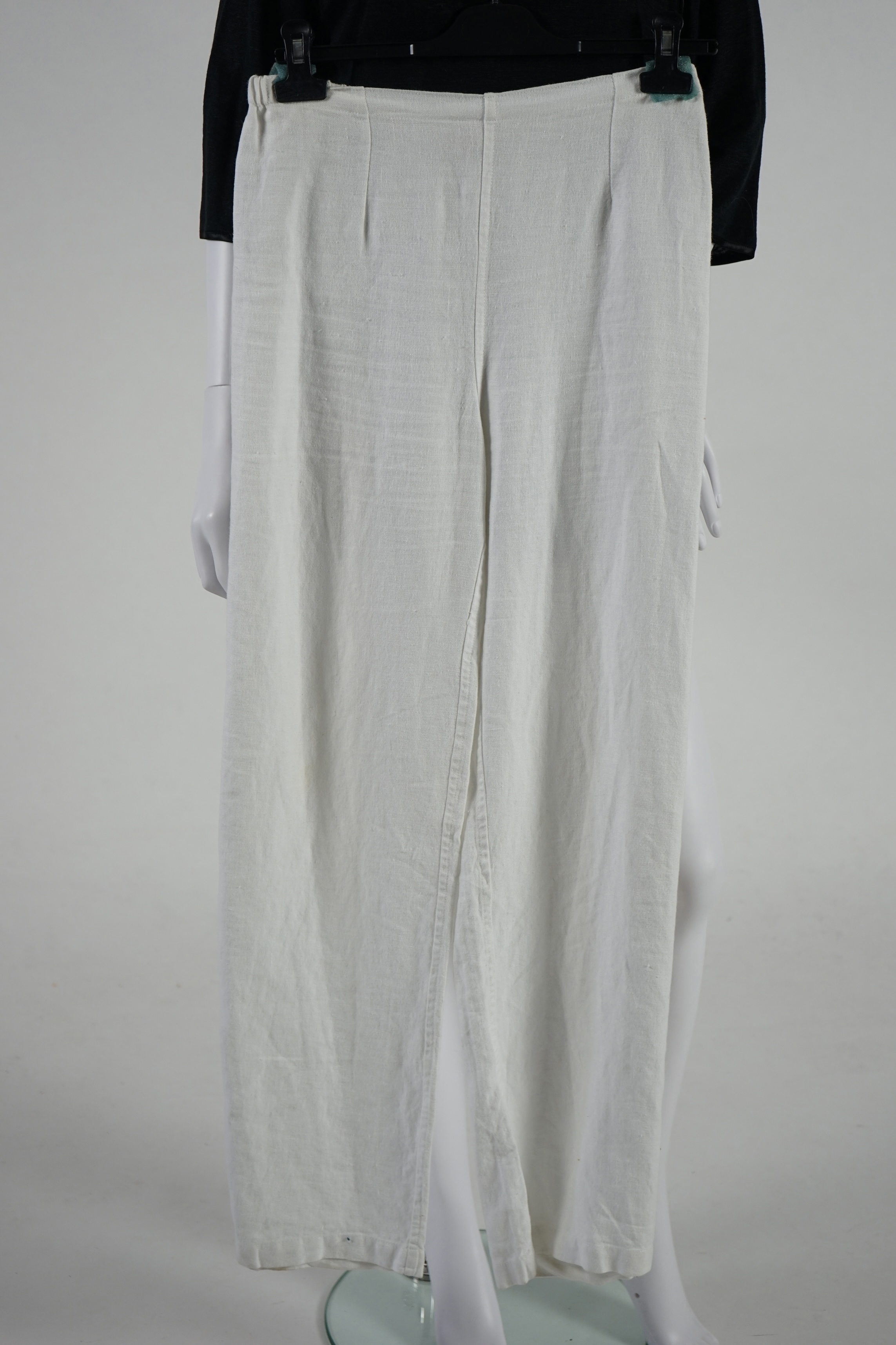 An assortment of lady's clothes including a knitted coat/cardigan, a Sahara velvet overshirt and linen trousers, a Joules white cotton lace top, an Aiger dark grey trouser and long sleeve lounge suit, etc. Sizes 14-16 Pr